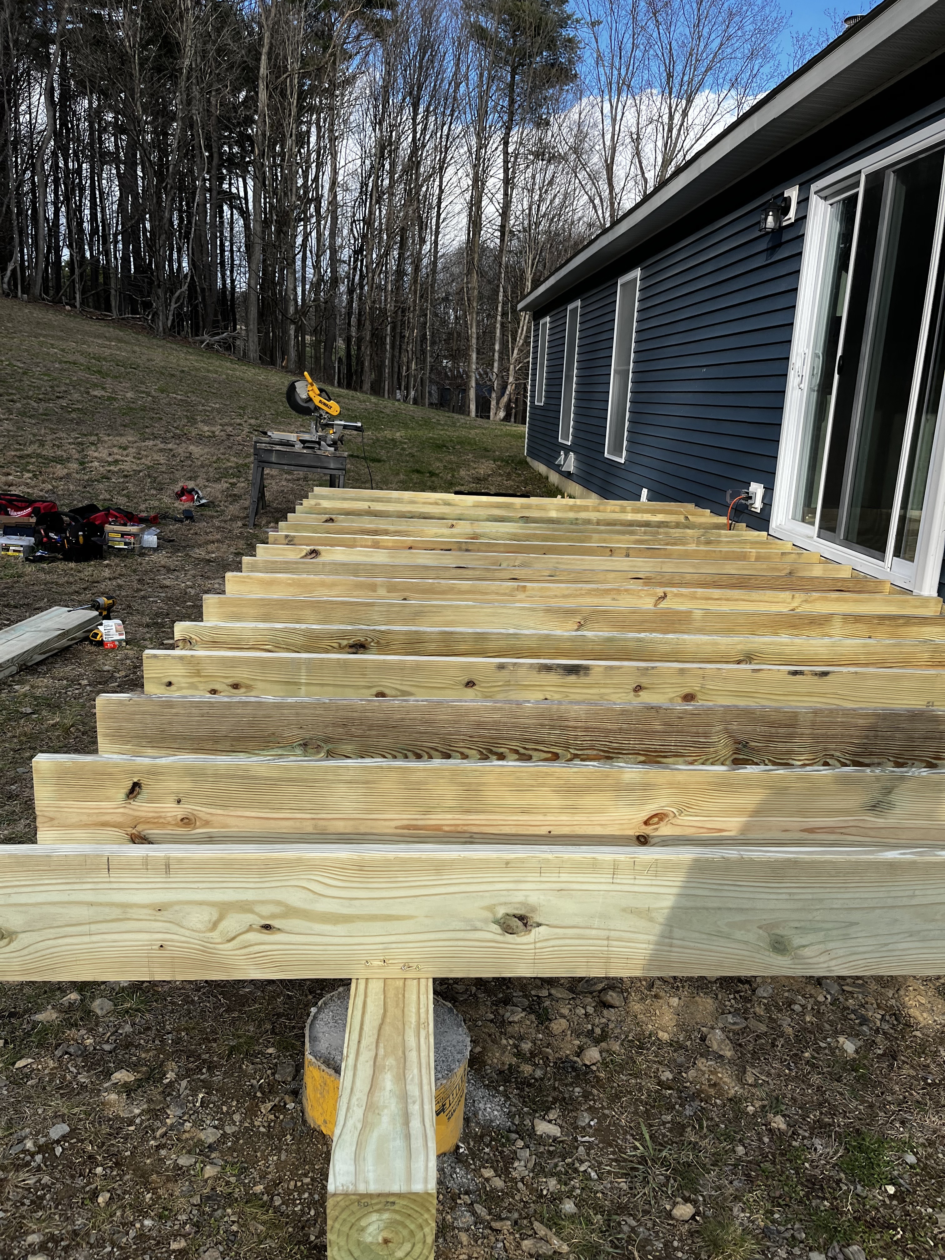 Close-up of the deck framing and lumber before the build was completed.